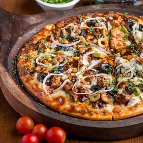Fresh pizza with colourful toppings
